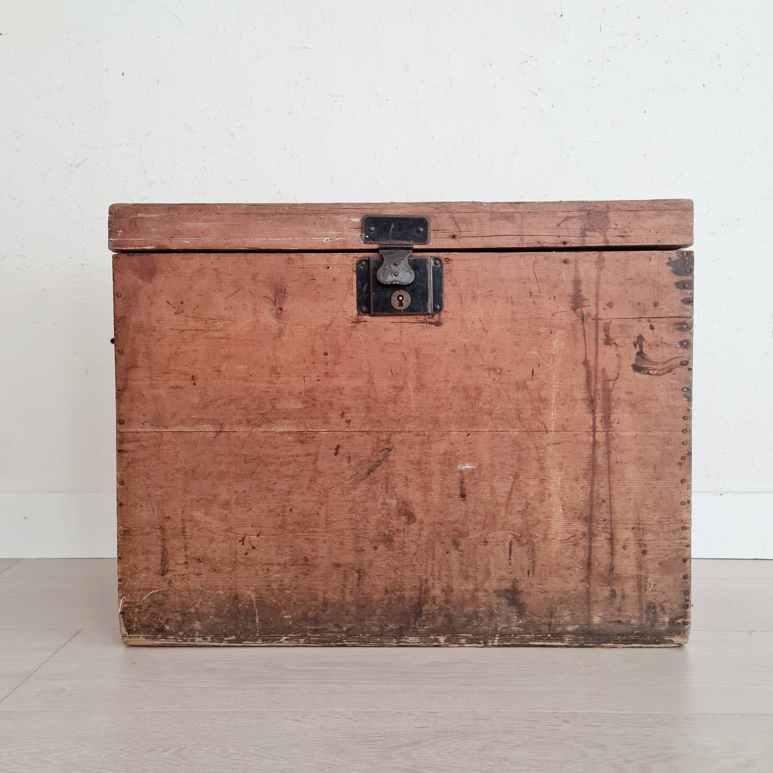 Old wooden chest with metal handles