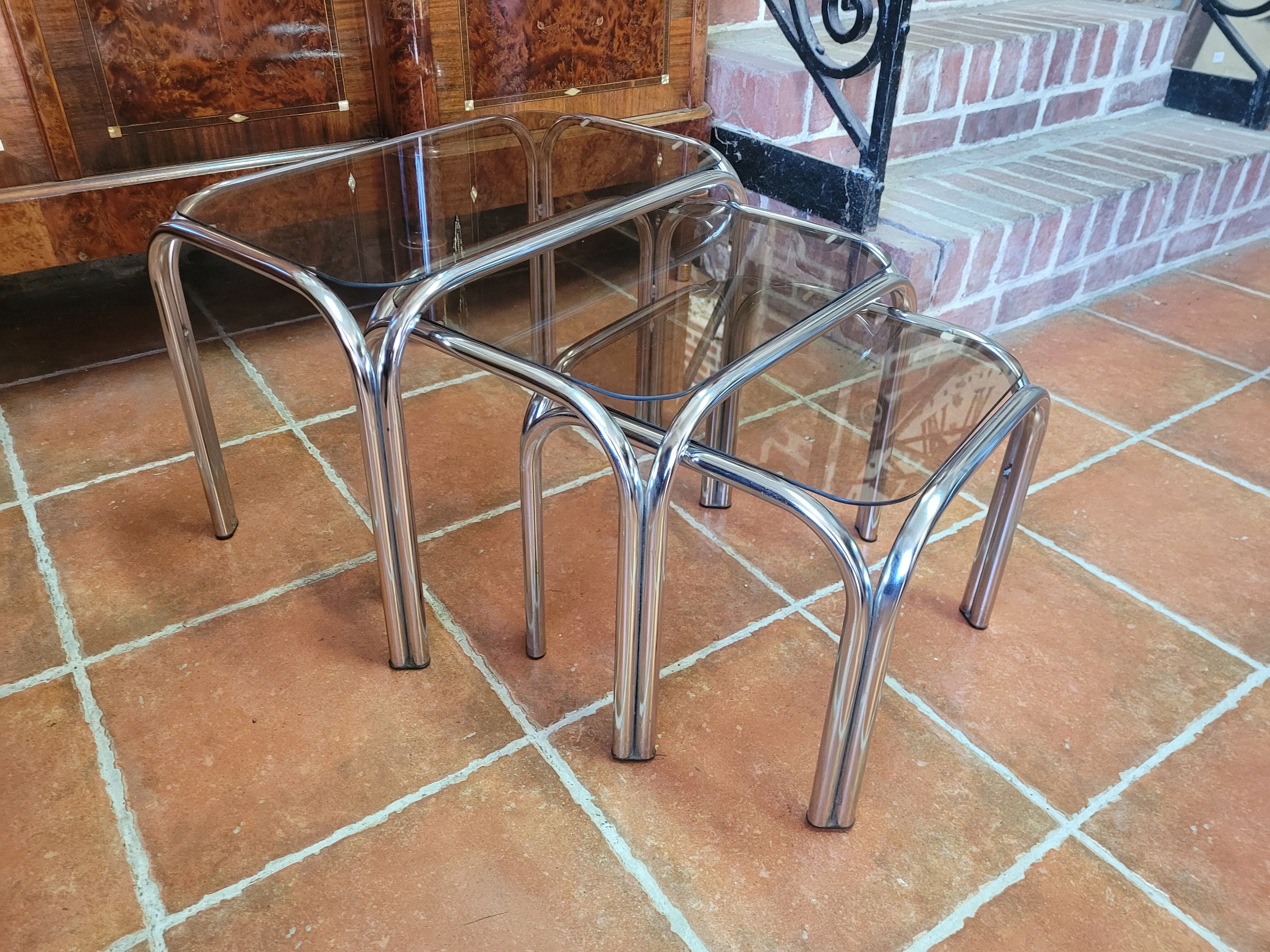 Chrome nesting table with smoked glass top from the 70s