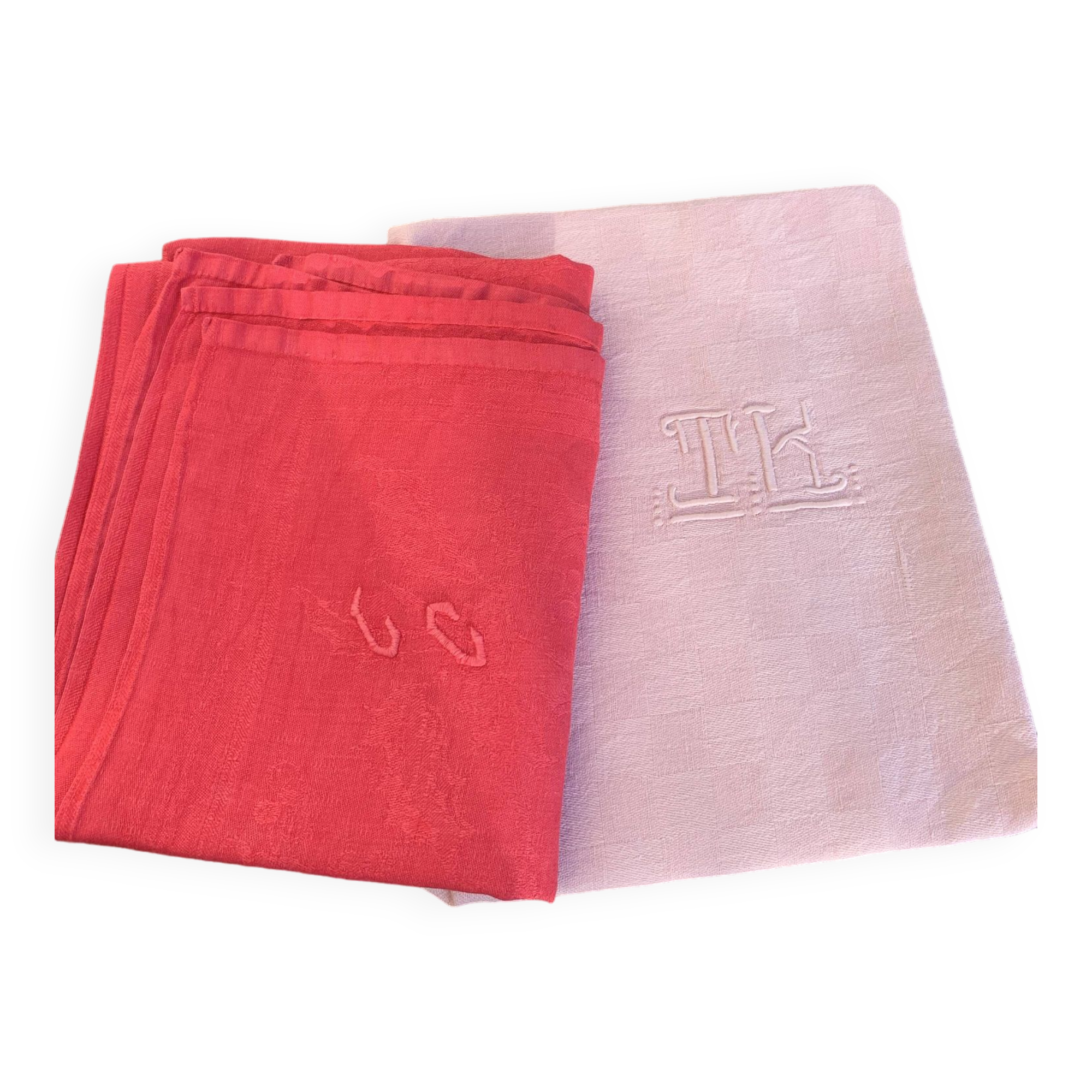 Duo set, consisting of two large pink-dyed cotton and linen towels, embroidered, TK monograms