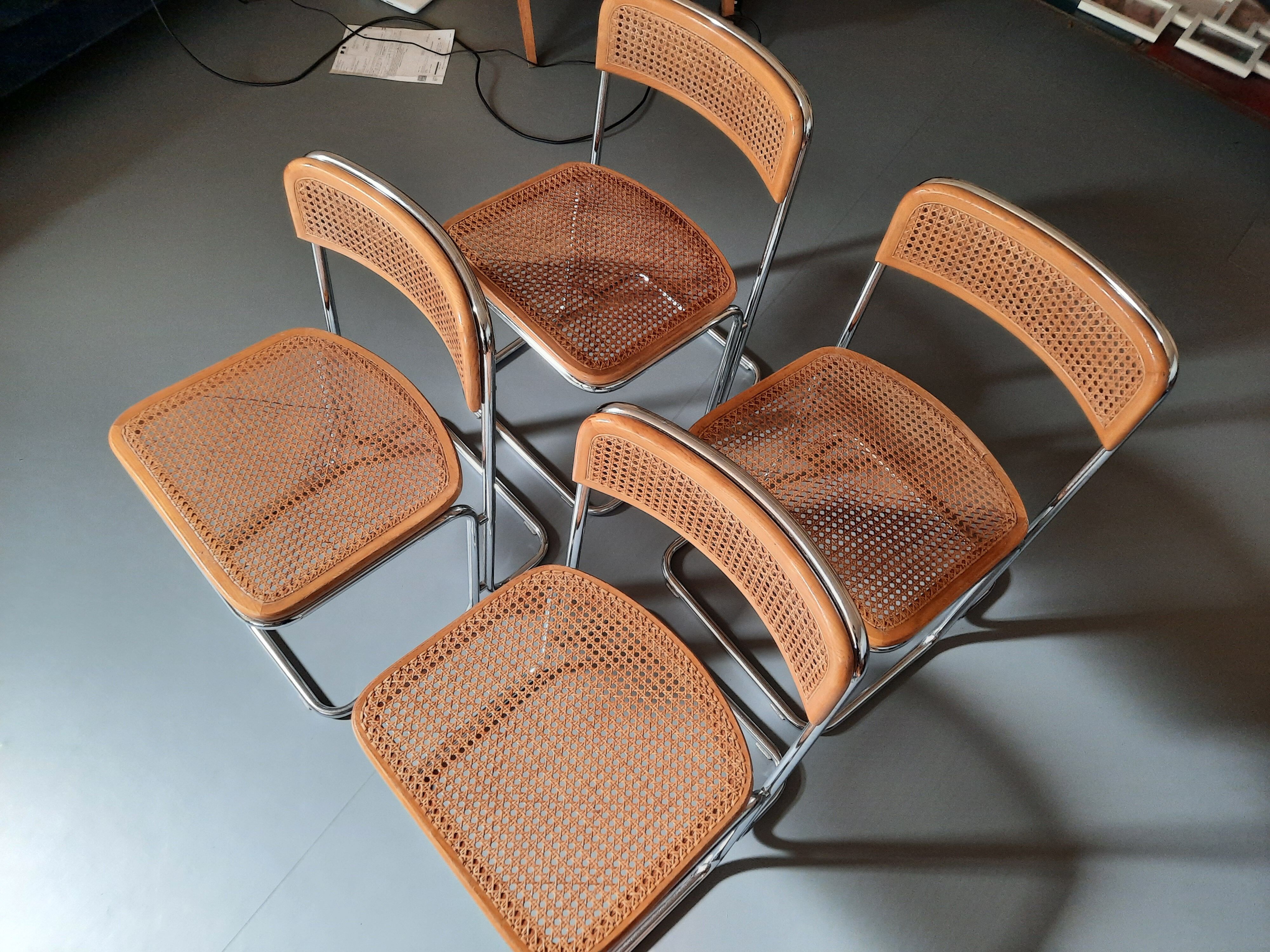Set of 4 TIVIR chairs in cane and chrome metal.