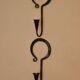 Pair of Swedish wall sconces in wrought iron, mid-20th century style, signed Akta.