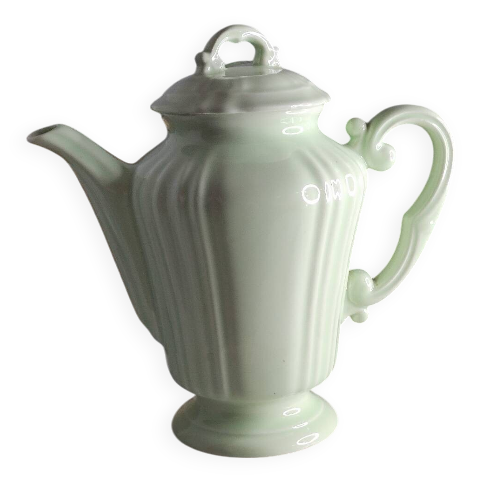 Green ceramic teapot
