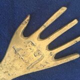 Hand-shaped brass stripper