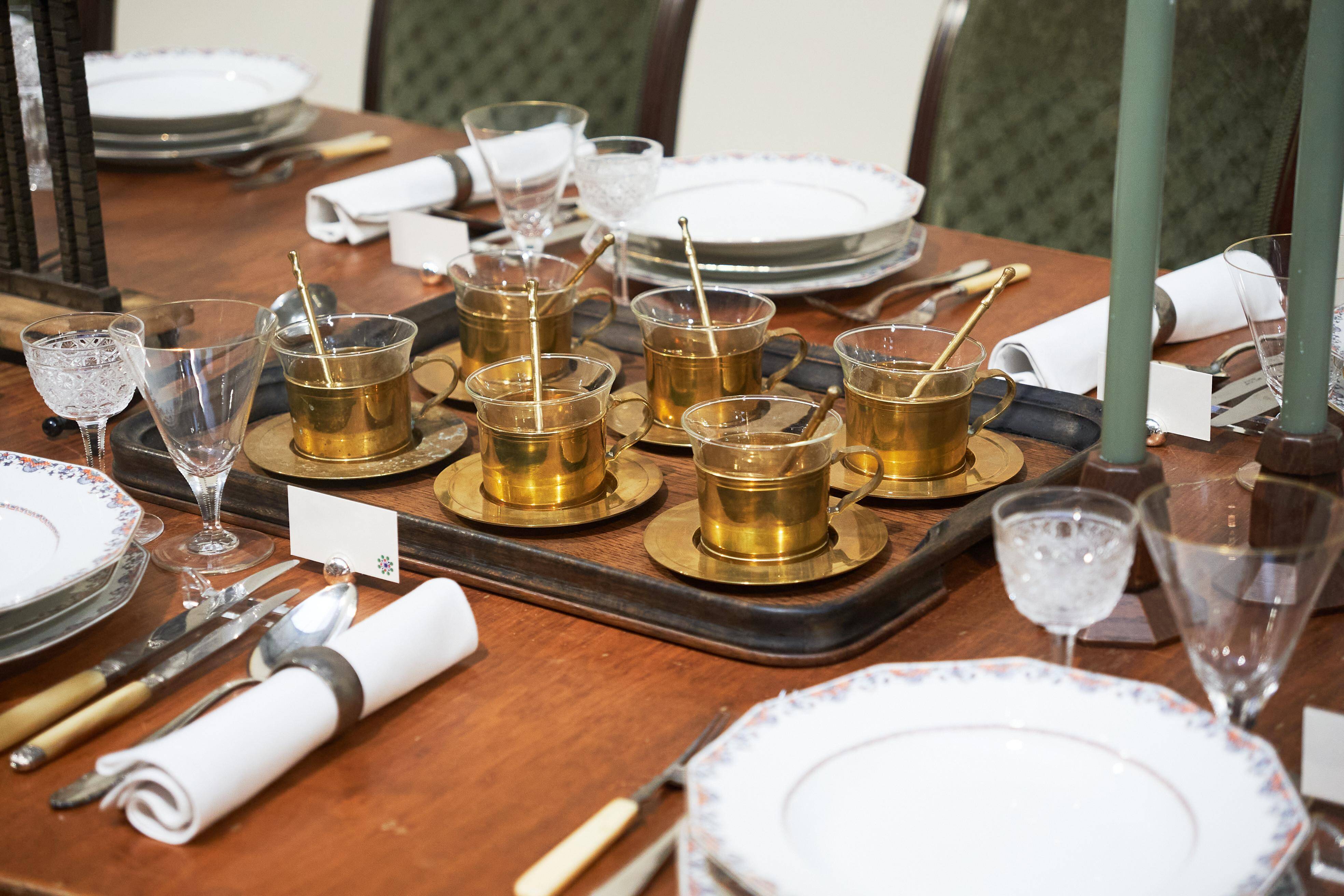 Mid-century tea service in patinated brass and glass