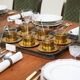 Mid-century tea service in patinated brass and glass