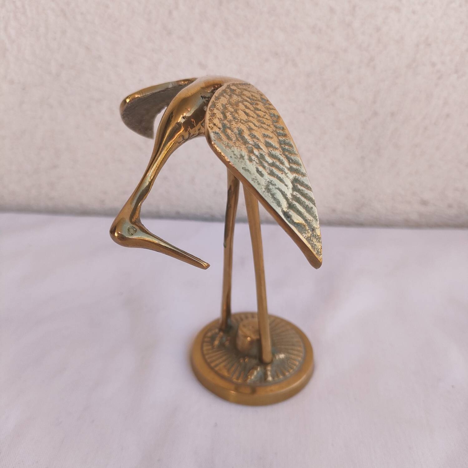 Trio of brass waders