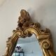 Old italian mirror in gilded plaster with leaf