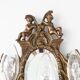 Pair of old French wall lights with beveled mirror and putti