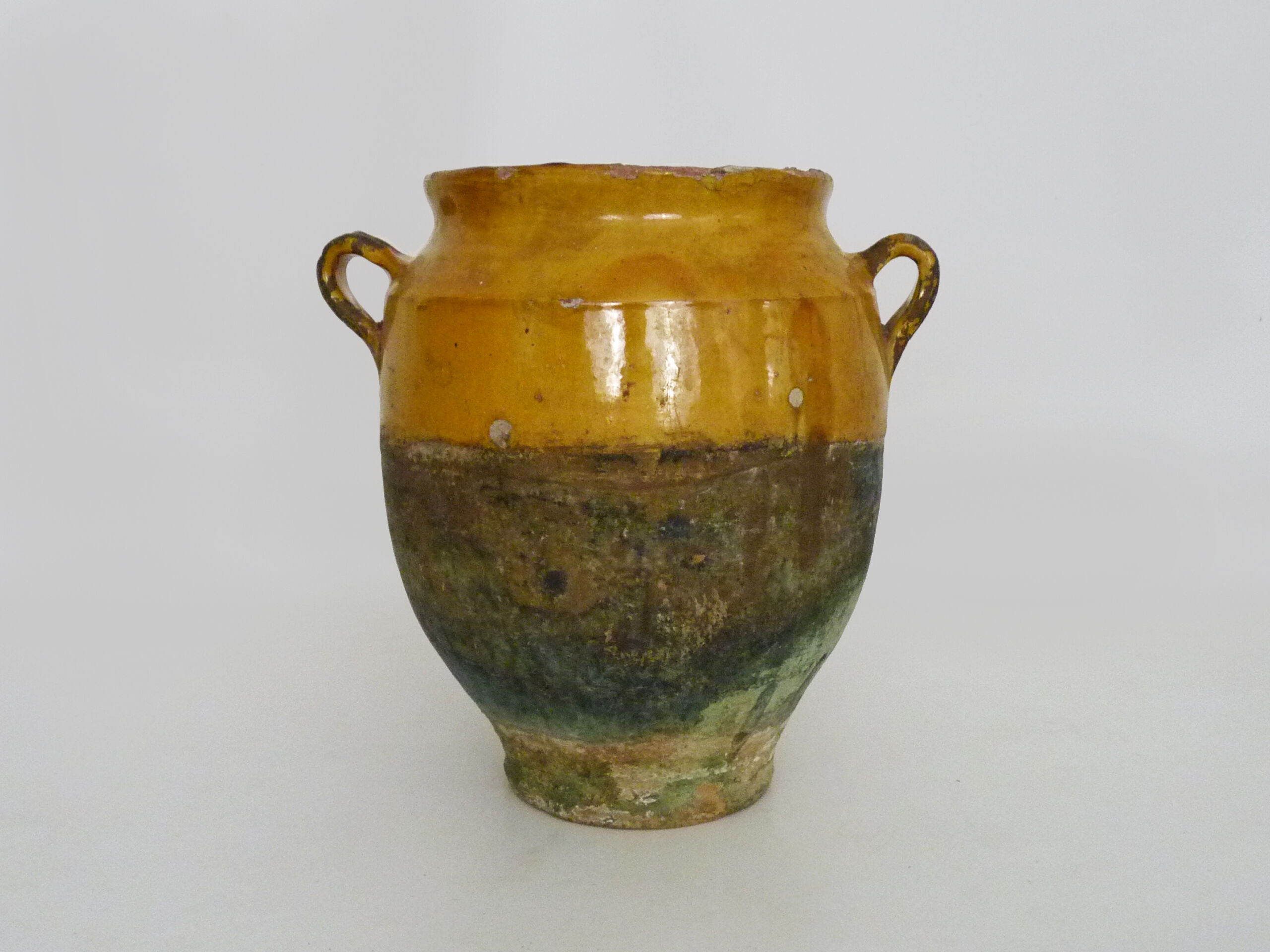 Magnificent glazed yellow confit pot, south-west of France. 19th century.