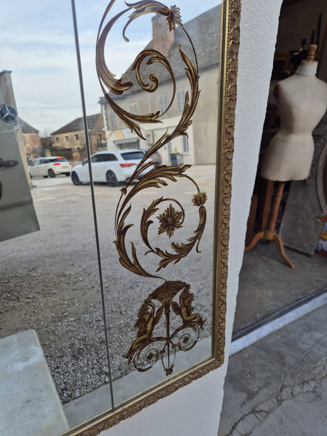 Antique gilded Venetian brasserie mirror in eglomised glass