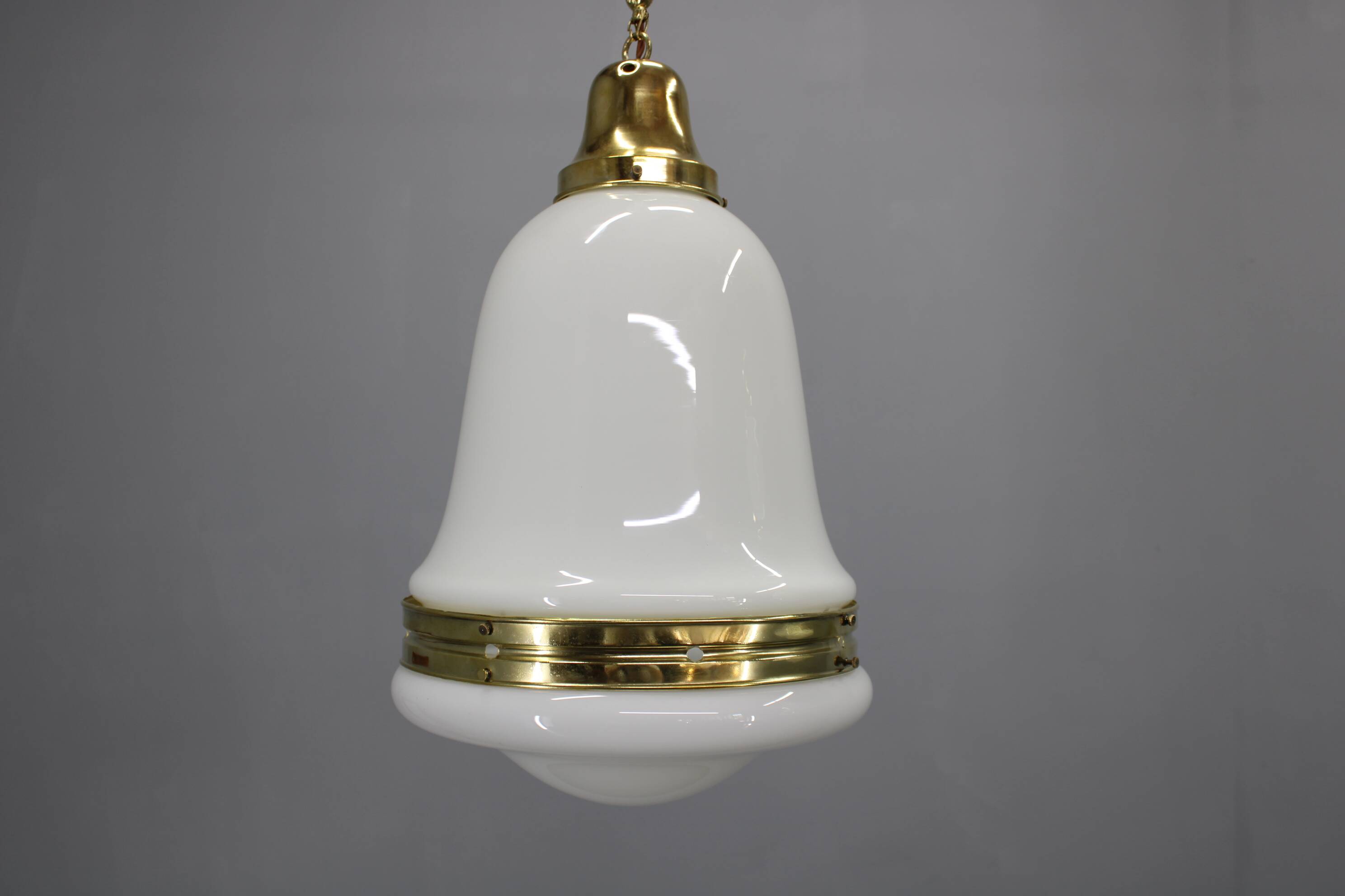 Pair of 1930s Peter Behrens Luzette pendants in opaline glass and brass