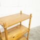 Scandinavian rectangular shelf from the 1960s, made of solid pine with round pencil legs.
