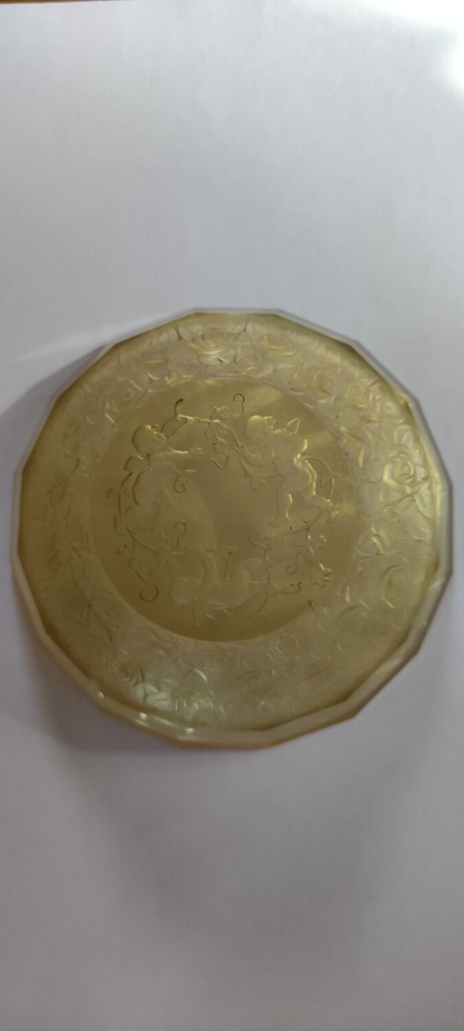Old empty cup golden yellow glass pocket