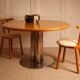 Circular dining table