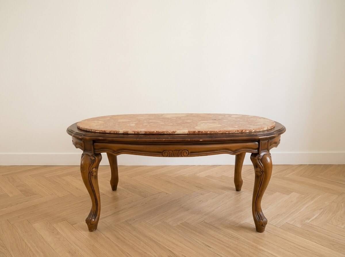 Table basse ovale en marbre et bois sculpté style baroque