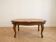 Table basse ovale en marbre et bois sculpté style baroque