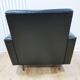 Fauteuil en skaï noir, années 1960