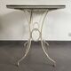 White wrought iron table