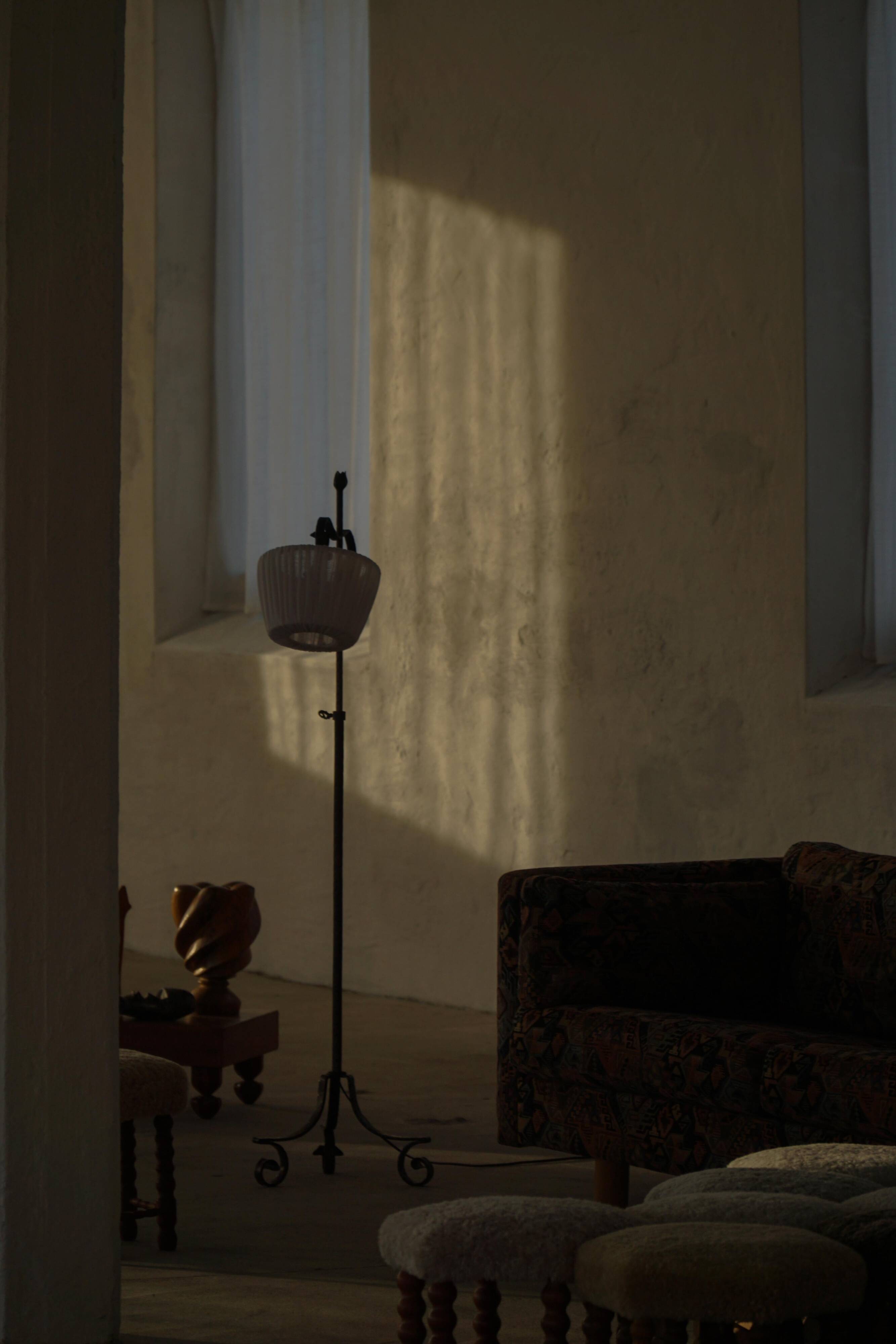 20th-century wrought iron floor lamp with swirling detail, Danish Art Deco.