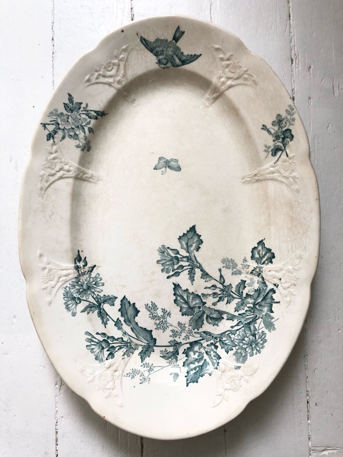 Flat oval iron earth bird and butterfly