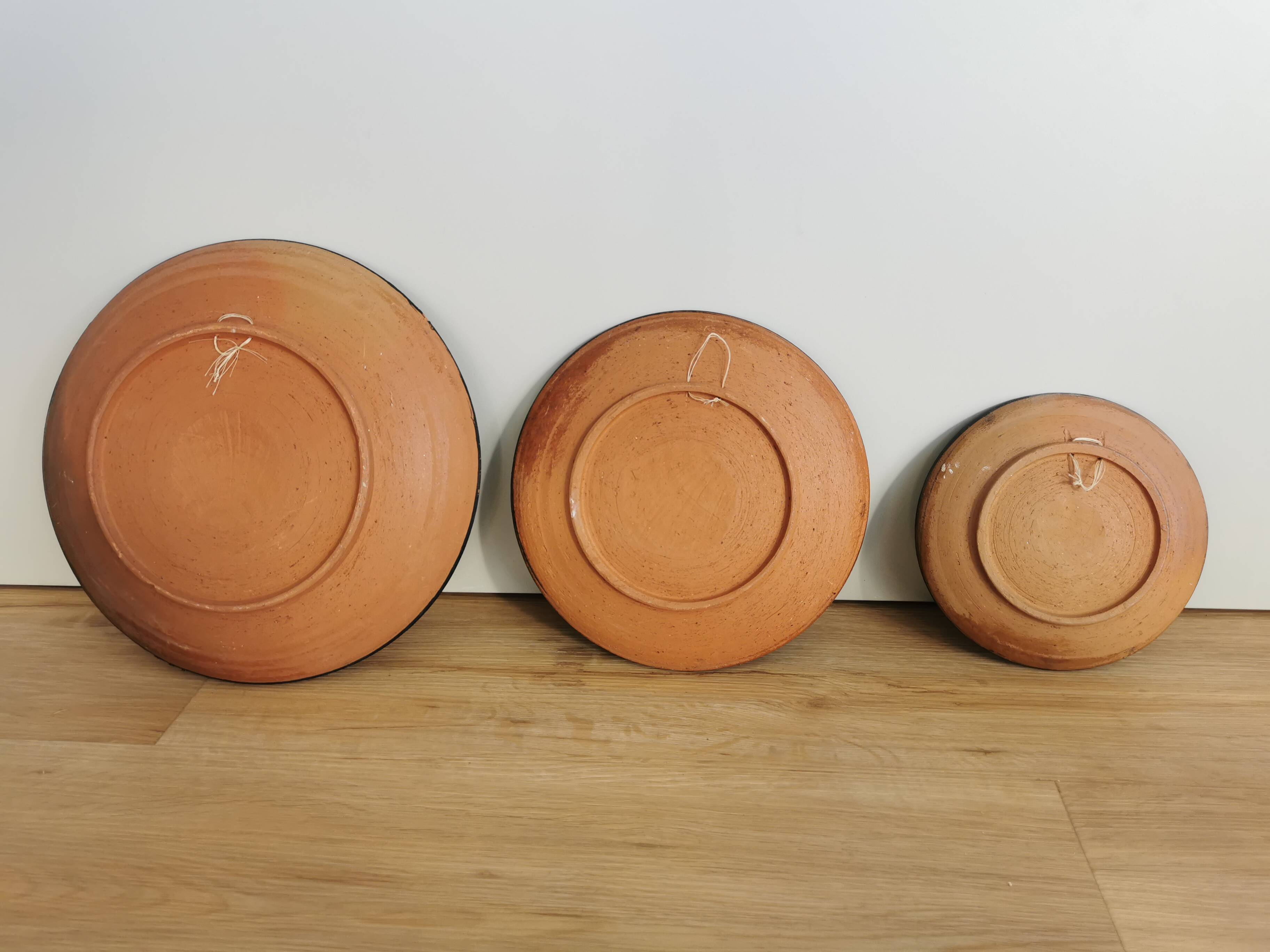 Vintage Hand-Painted Clay Plates: 1970s Yugoslavian Floral Wall Decor
