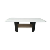 Low table in travertine and aluminium
