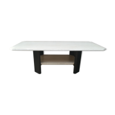 Low table in travertine and aluminium