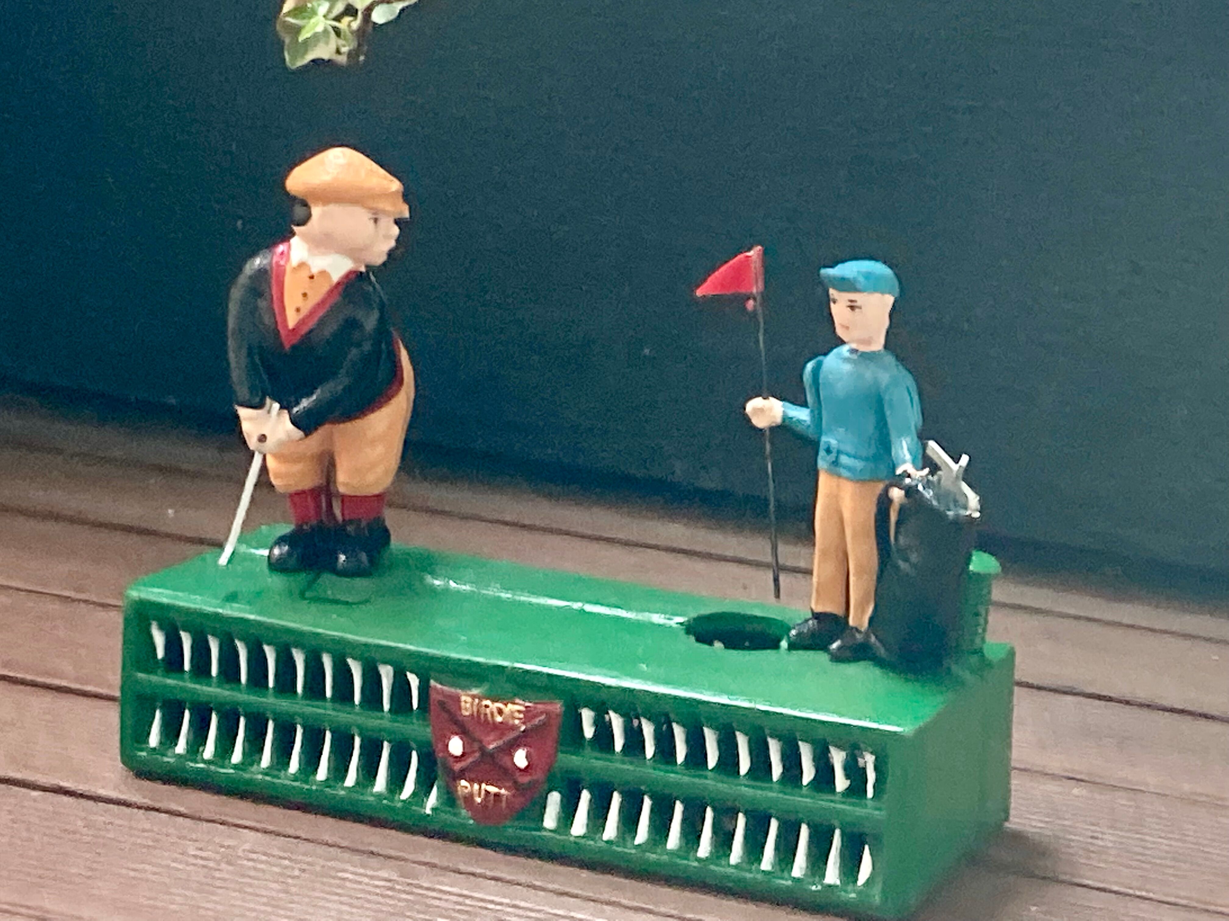 Mechanical piggy bank - golfers - vintage