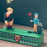 Mechanical piggy bank - golfers - vintage