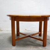 Vintage extendable round wooden dining table