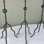 Sculptural candle holder trio