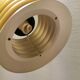 Hanging lamp in gold-colored aluminum with many layers of shades.