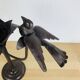 Brutalist wrought iron candle holder with birds