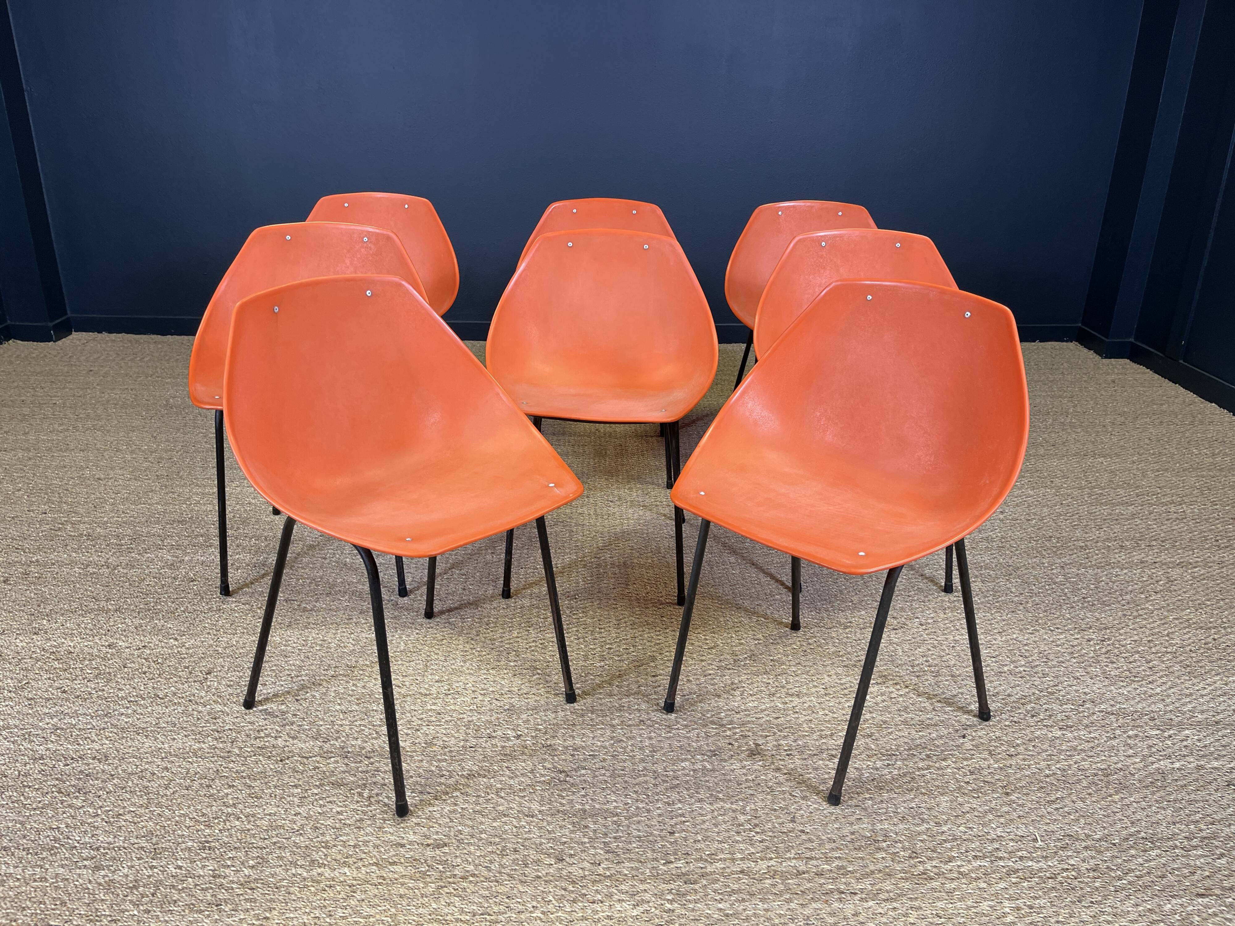 Set of 8 orange Guariche chairs
