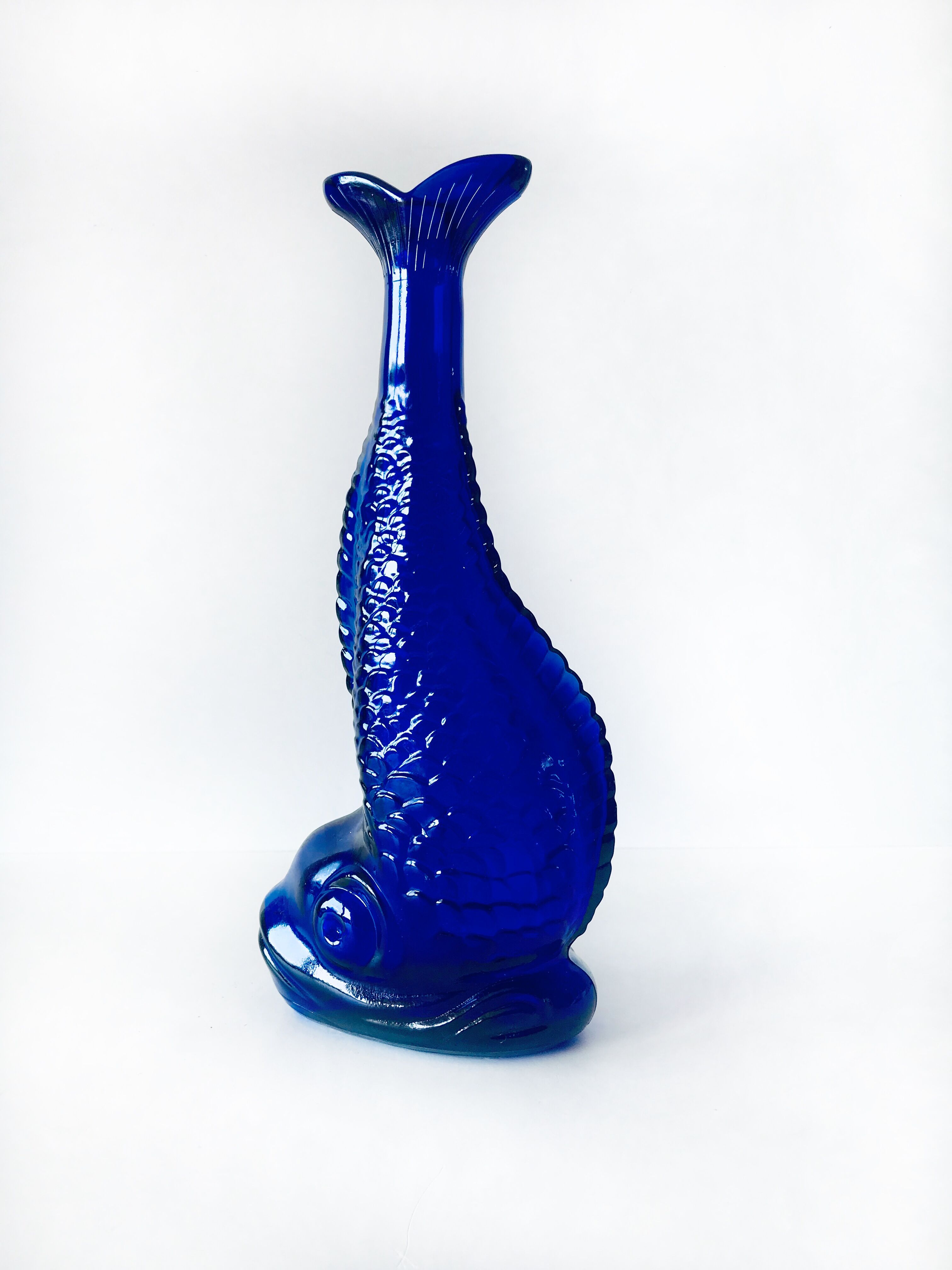 Blue glass fish vase
