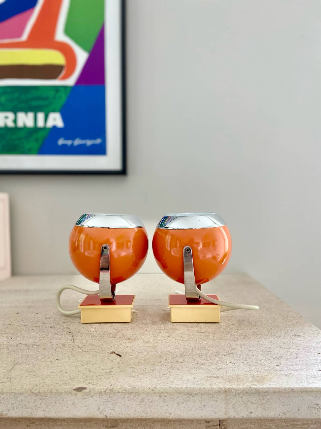 Pair of bright orange "Eye-Ball" wall lights - 1970.