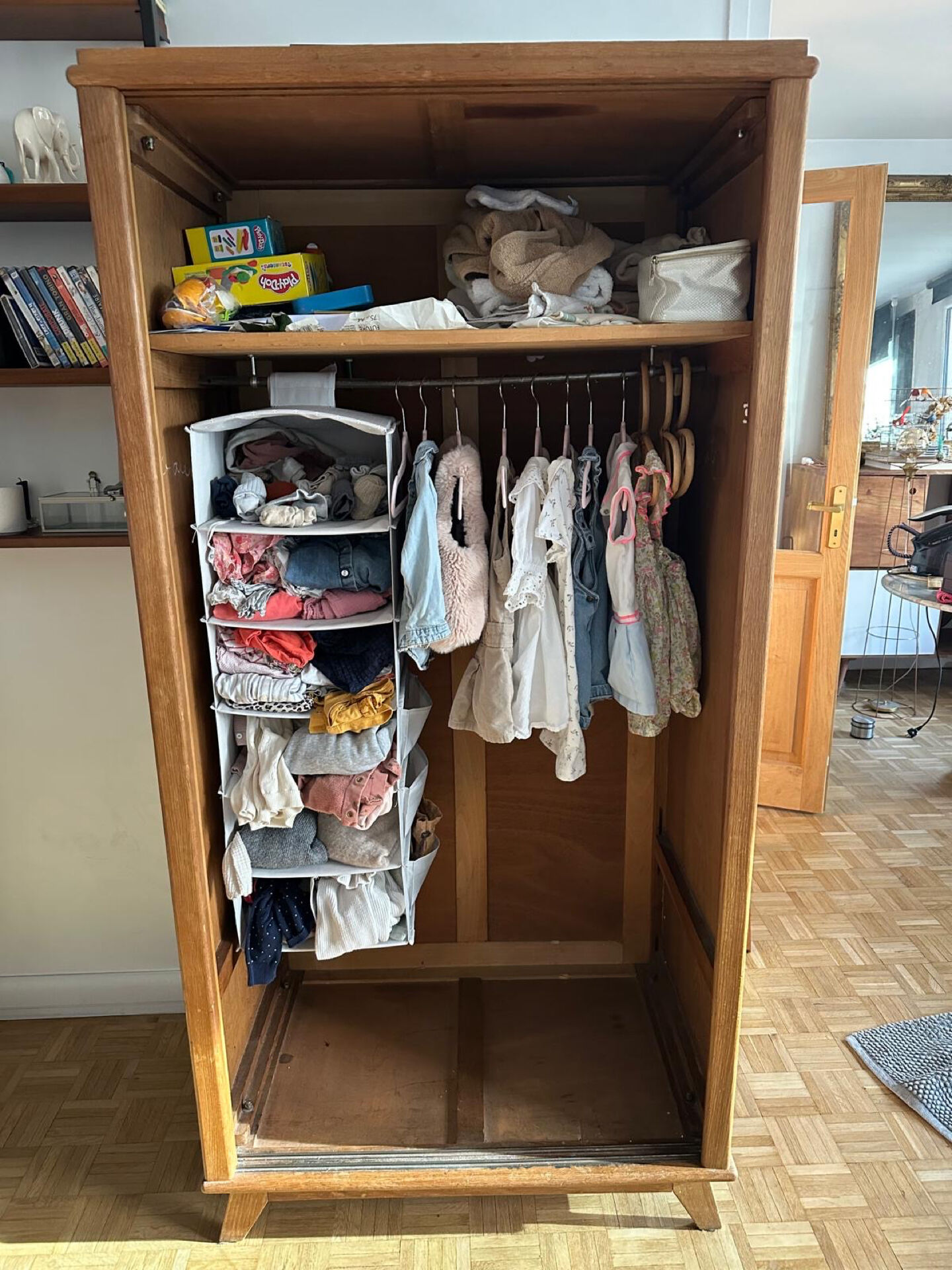 Scandinavian wooden wardrobe with sliding doors