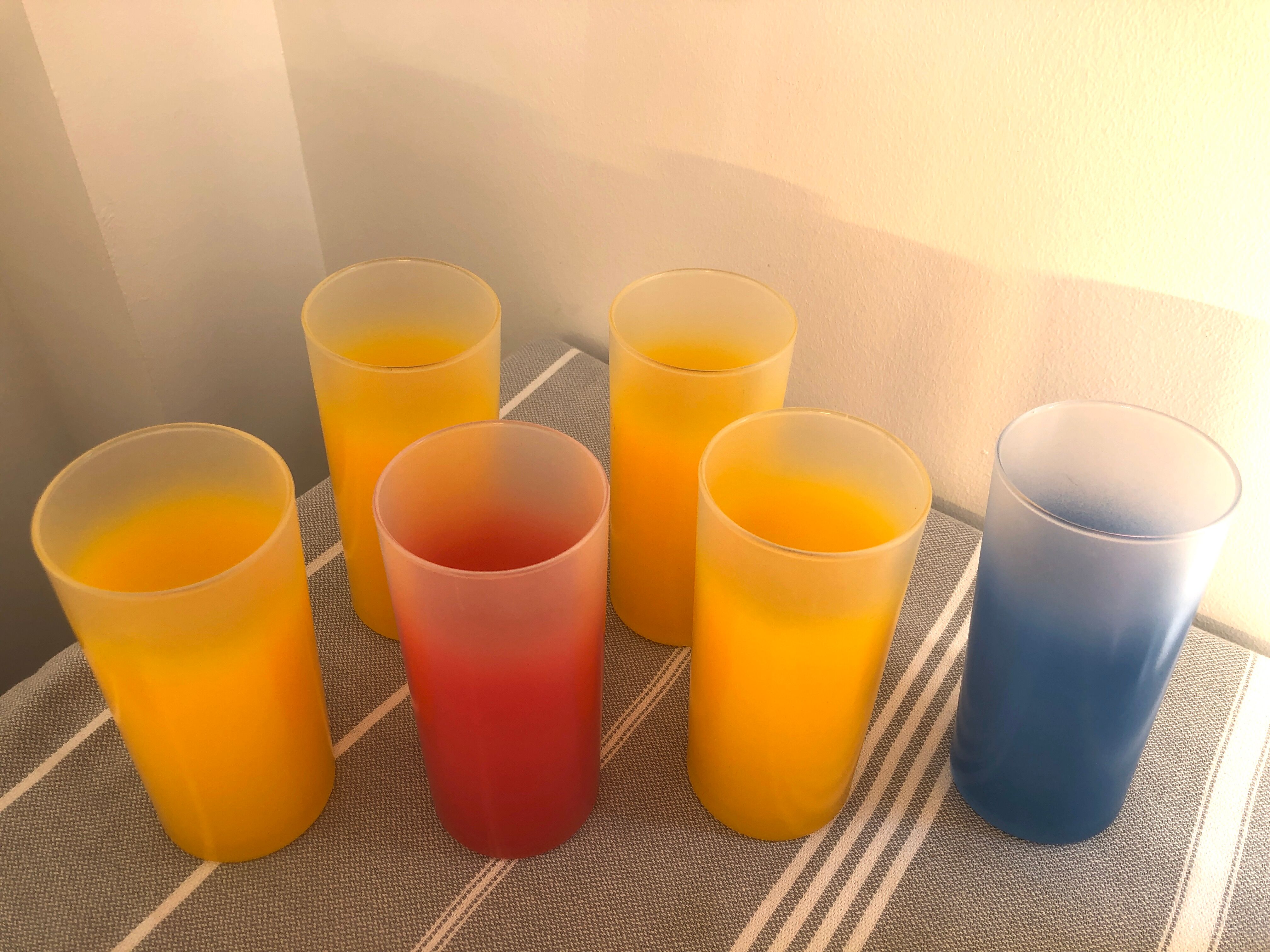 Yellow, red and frosted yellow orangeade glasses made of vintage glass