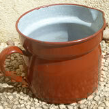 Old enameled steel pitcher