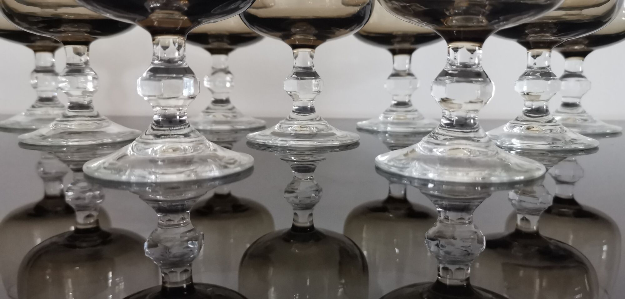 9 glasses of white wine on vintage stand Luminarc Smoked Black