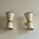 Pair of vintage wall lamps, solid brass and unbleached fabric, Italy 1980