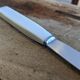 Set of 10 vintage stainless steel and bakelite table knives