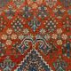 Vintage Turkish rug in brick red and indigo with floral design, 276 × 389 cm