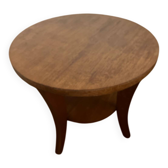 Low round art deco table in honey wood