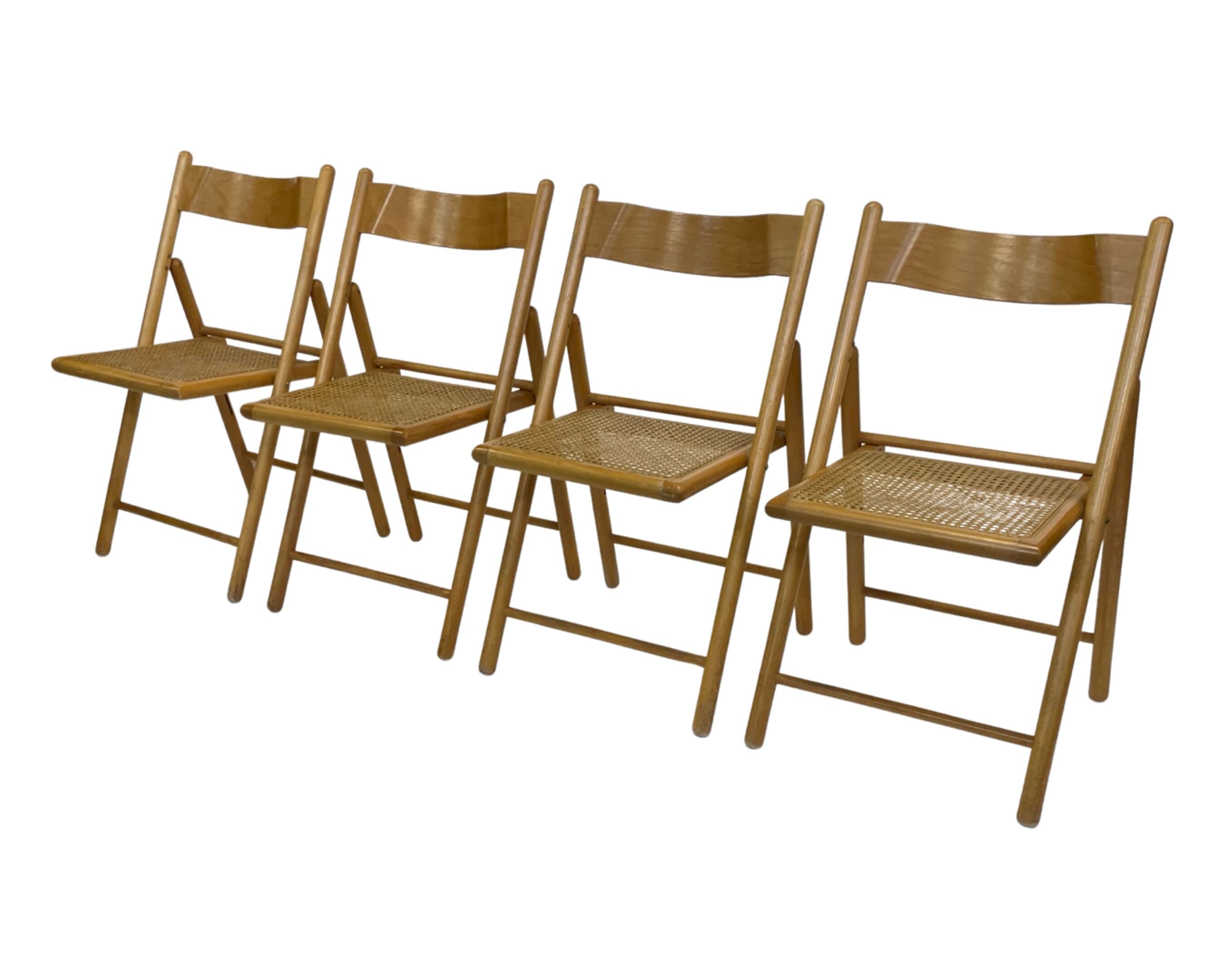 Set of four vintage folding chairs with webbing and wood 1970s