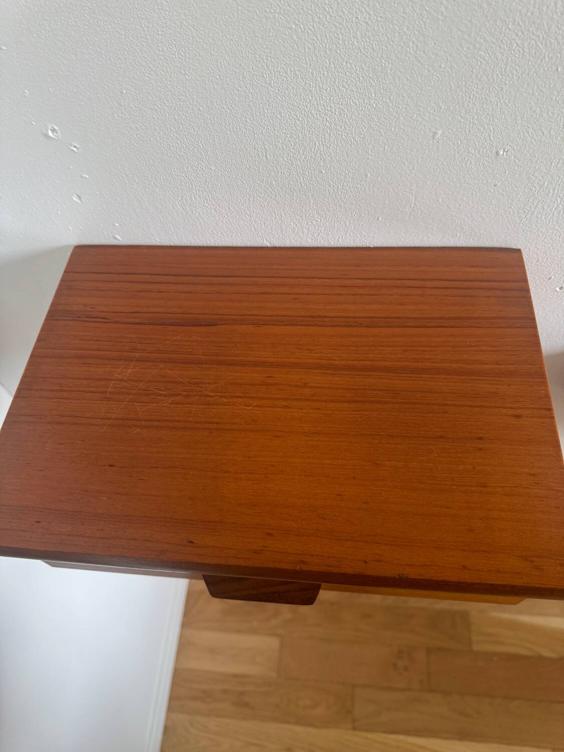 Vintage Scandinavian teak wall-mounted bedside tables.