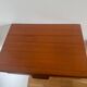 Vintage Scandinavian teak wall-mounted bedside tables.