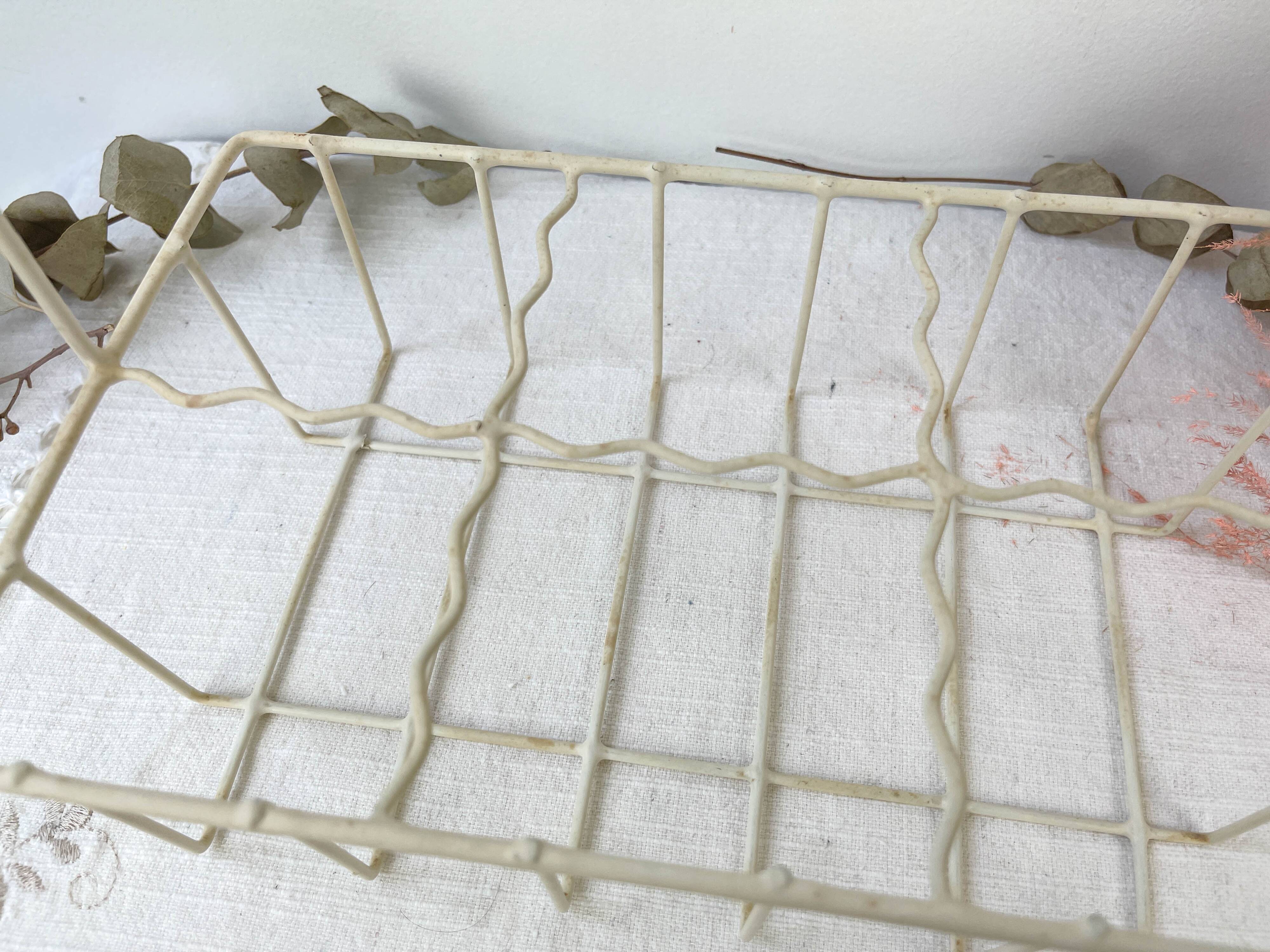 6 colorful juice glasses in their vintage basket