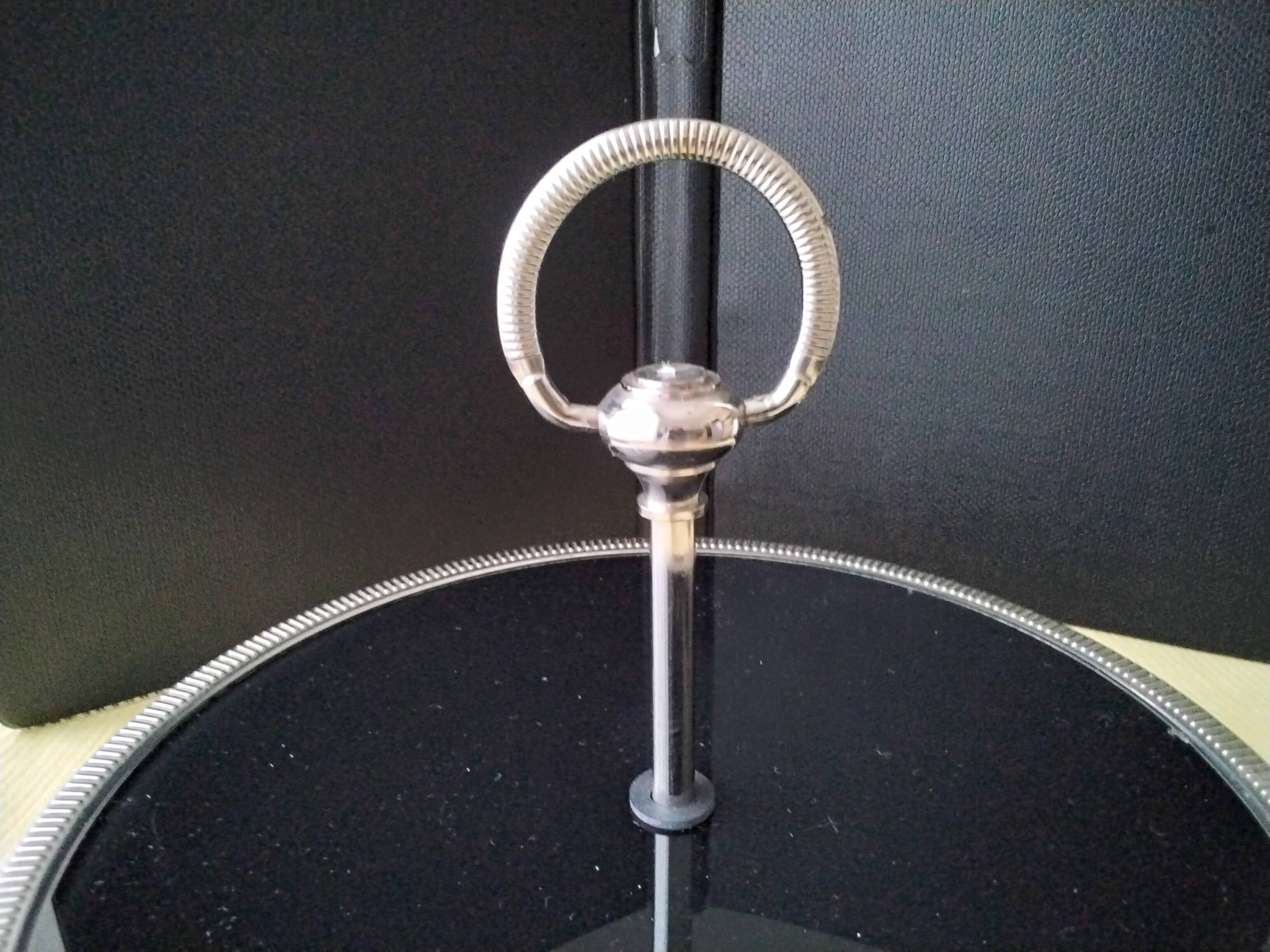 Cheese tray on shower stand in stainless steel and black tinted glass