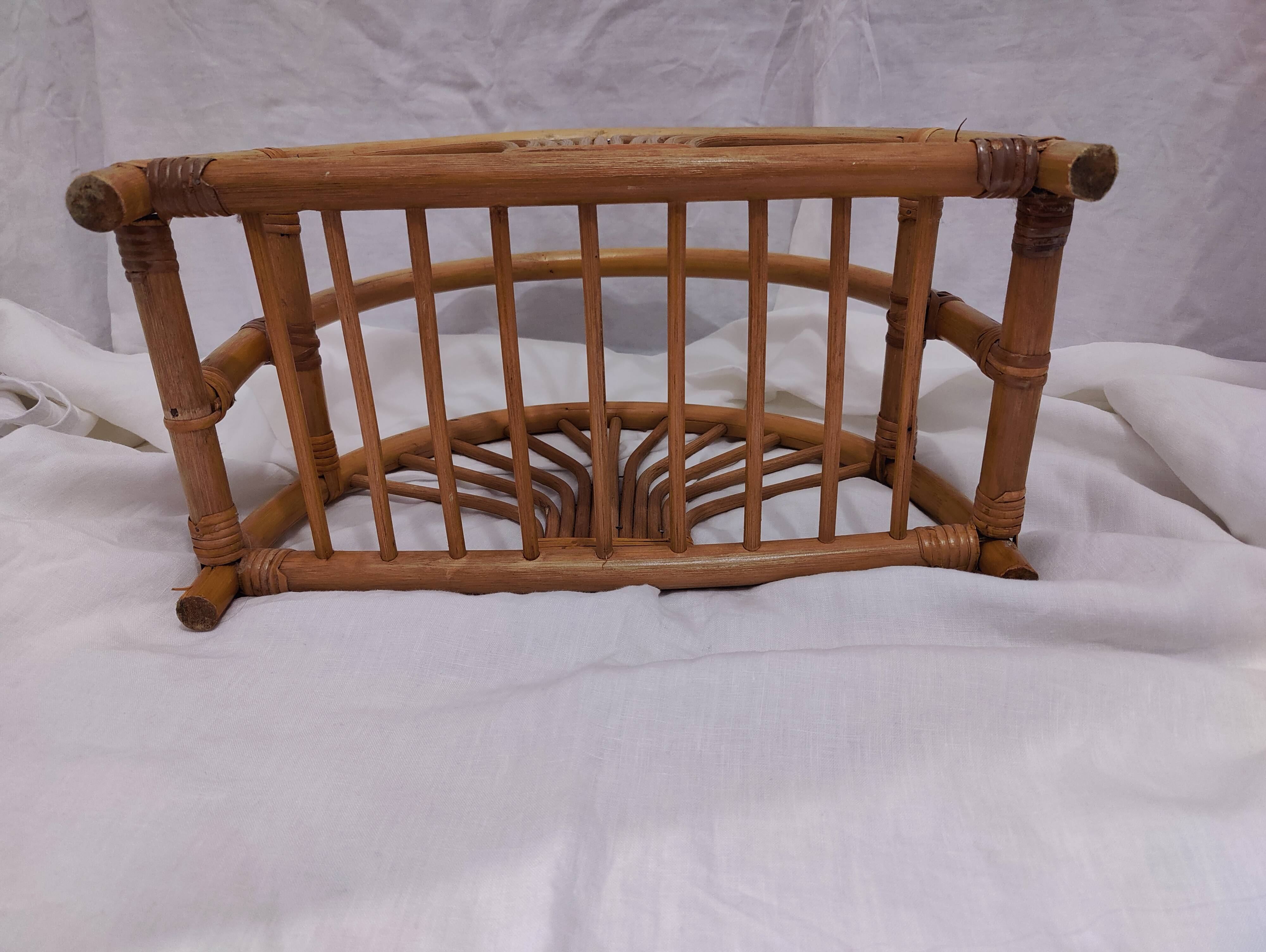 Woven bamboo magazine rack from the 1970s